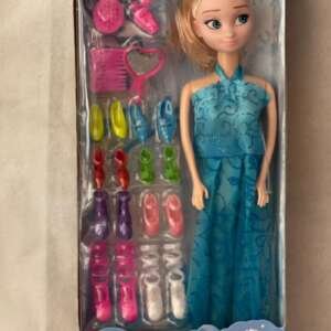 Poupée Elsa avec accessoires d'habillages